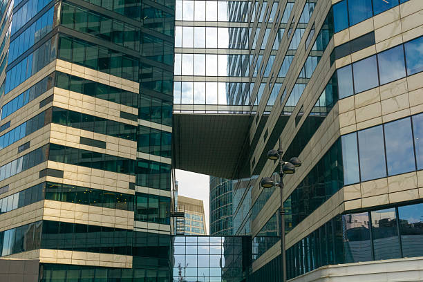 istock Reflection in windows of modern office building 2227928555