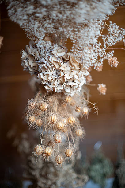 istock Vertical Rustic Dried Flower and Seed Pod Arrangement 2227929222