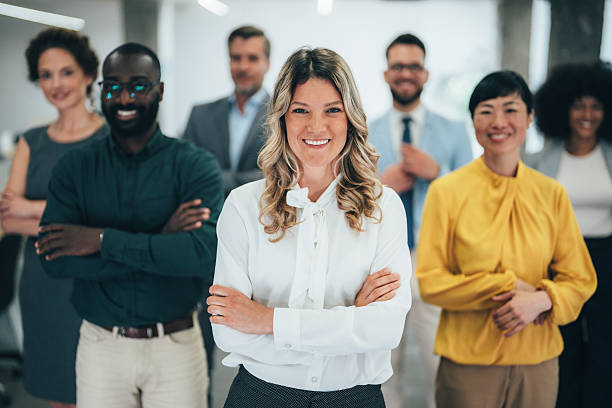istock Confident female leader with diverse business team in modern office 2227936744