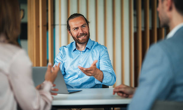 istock Business professional leading team meeting in modern office 2227936749