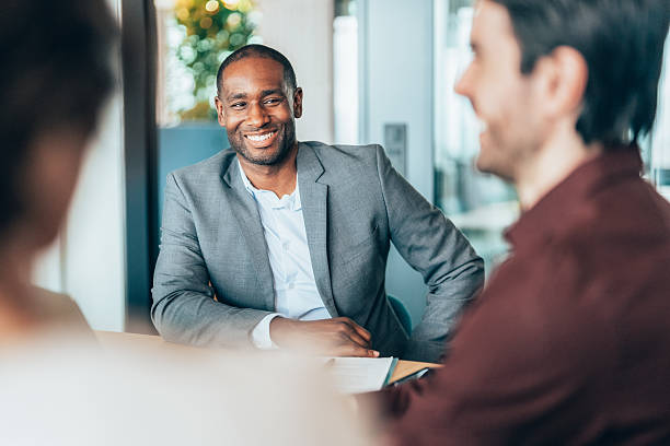 istock Confident Black Business Leader in Modern Office Meeting 2227937038