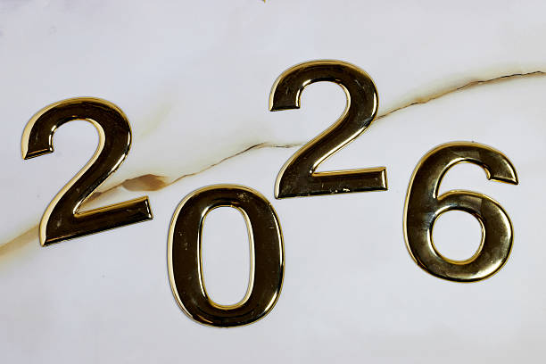 istock Golden Numbers Displaying the Year 2026 on a Marble Background 2227940834