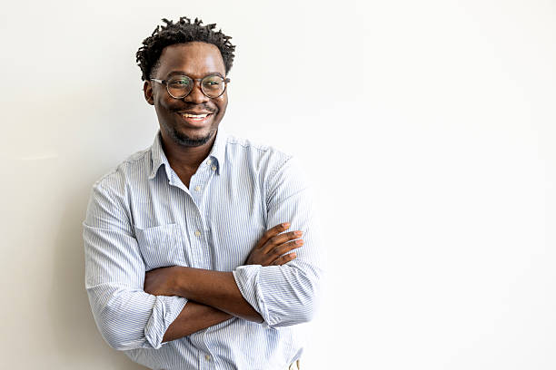 istock Confident Smiling Man in Casual Shirt Against White Background 2227947879