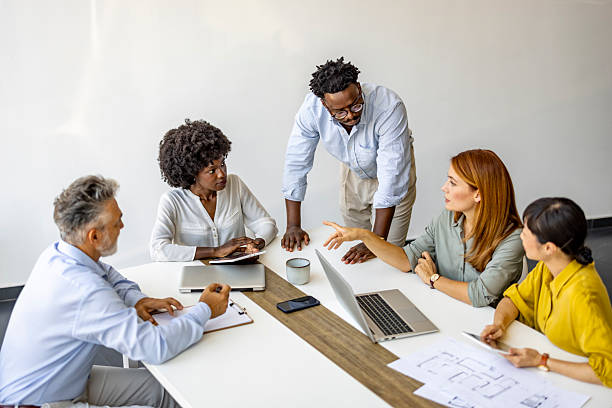 istock Diverse Business Team Collaborating in Modern Office Meeting 2227949437