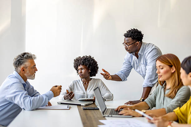 istock Diverse Team Engaged in an Intense Business Discussion 2227949438