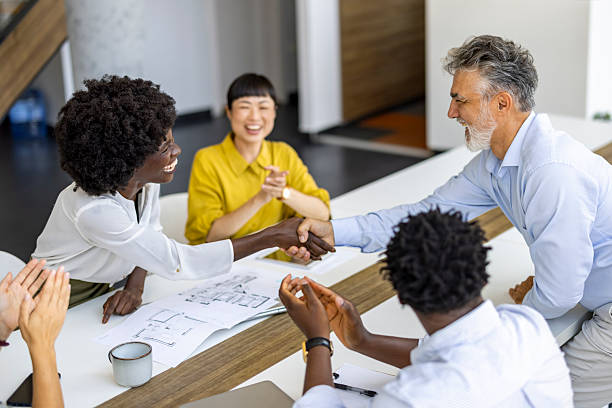 istock Successful Business Meeting with Diverse Professionals Shaking Hands 2227949466