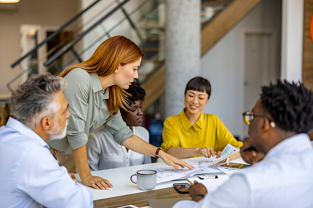istock Dynamic Team Engaging in a Productive Business Meeting 2227949472