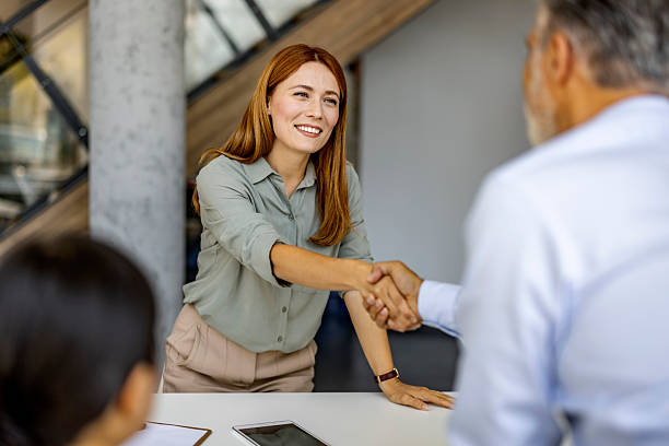 istock Business Professionals in a Successful Handshake Agreement 2227949496