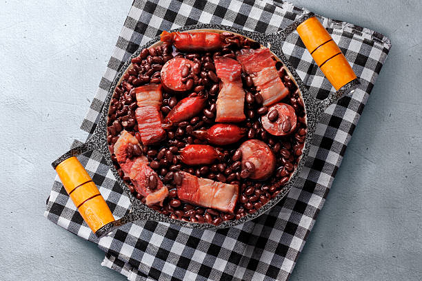 istock Brazilian feijoada, traditional food from Brazil cuisine, on rustic pan 2227953441