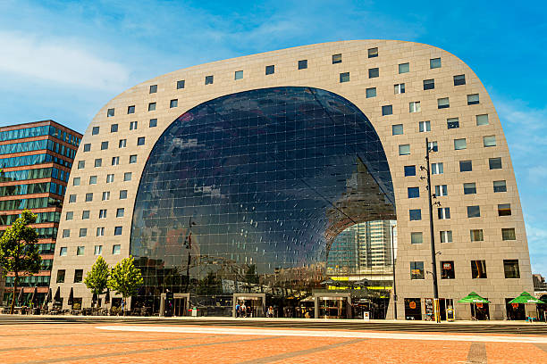 Iconic Markthal Building Under a Vibrant Blue Sky in Rotterdam