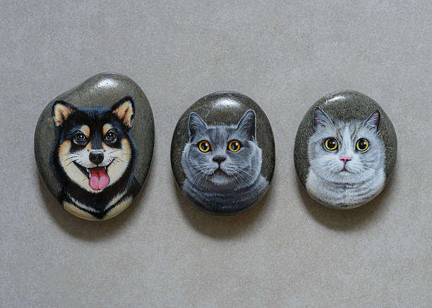 Cat and Dog Painted on Stone