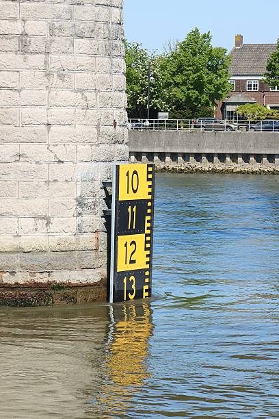 Floodwater depth indicator sign, or board. Indicate water level during flooding in Outback, rural Australia. Copy space.