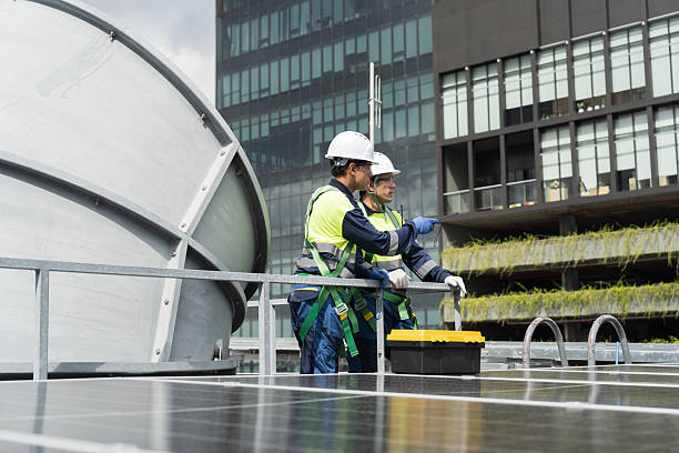istock Engineer or technicians maintenance and repair of cooling towers for preventing issues Legionella growth on rooftop of building 2227967104