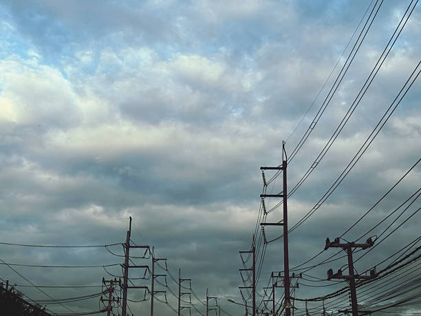 istock Electricity post with cloudy sky background, electricity post in Thailand. 2227969679