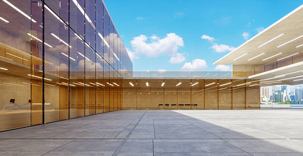 istock 3d rendering modern glass building exterior with empty square on a sunny day 2227975953