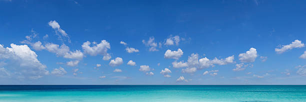 istock Panoramic view of tropical ocean and cloudscape on sunny day 2227975963