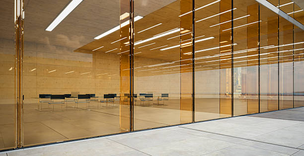 istock Modern conference room with amber glass partitions 2227976942