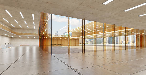 istock Spacious modern lobby with city skyline view and natural light 2227976947
