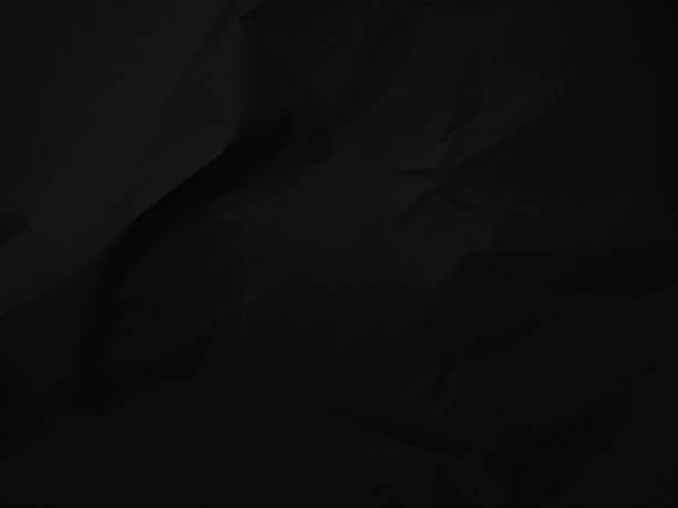 istock Dark black crumpled paper 2227980138
