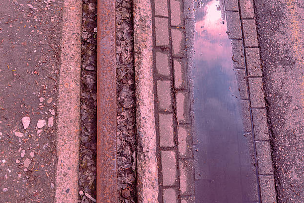 Asphalt street with train rails