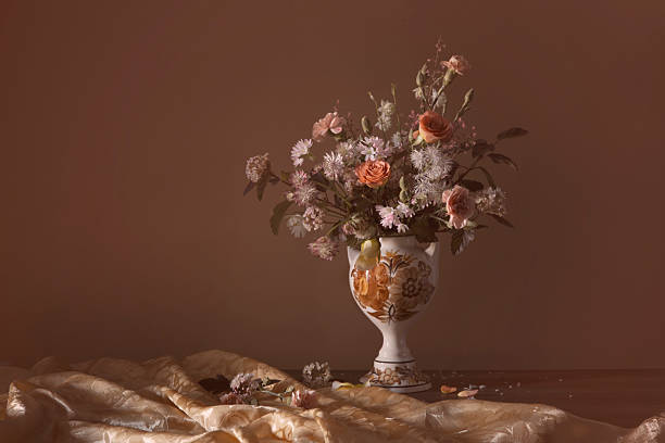 istock summer flowers in vintage ceramic vase on dark background 2227995663