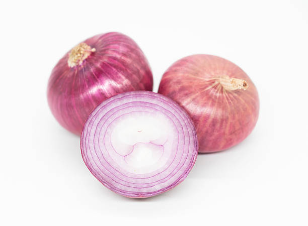 istock whole and slice Onion, isolated on white background 2227995758