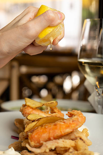 Fried prawns with chips, lemon and mayonnaise