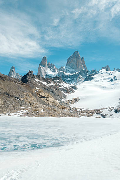 istock Majestic snow-capped mountain peaks under blue sky 2228007620