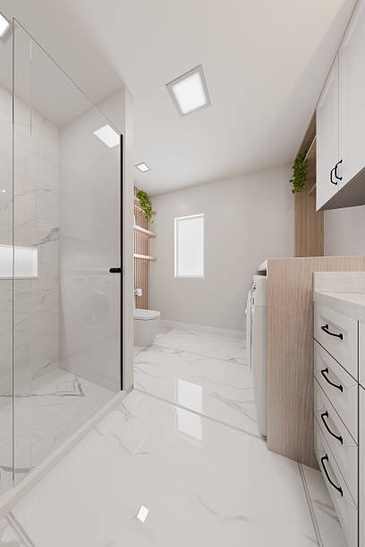 istock spacious bathroom showcases a sleek shower, minimalist toilet, and functional laundry space, highlighted by bright lights and contemporary fixtures that enhance the rooms modern aesthetic. 3d render 2228009600