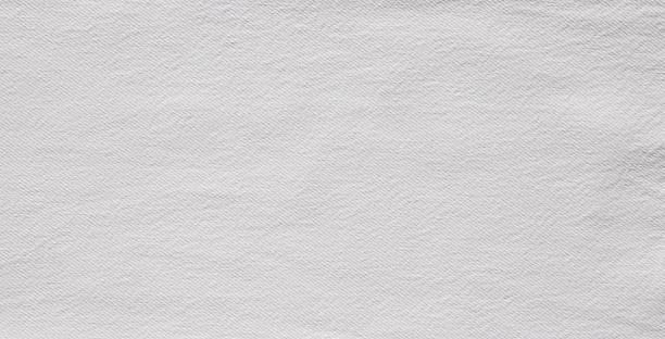 texture of light white jeans denim fabric background