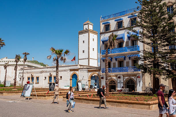 Mosque Ben Youssef at Essaouira in Marrakesh-Safi, Morocco, with many people walking past