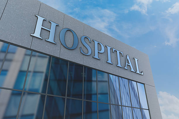 istock Modern Hospital Building Facade with Blue Glass Windows 2228017977
