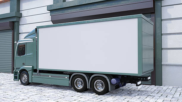 istock Blank Advertising Truck Parked Outside a Warehouse 2228018491