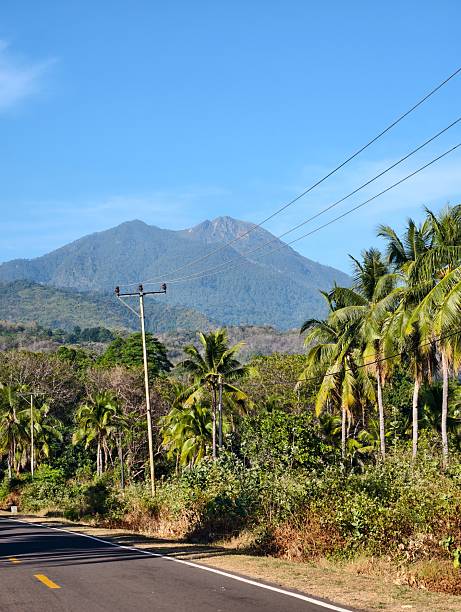 istock A beautiful road beneath the volcano. 2228018694