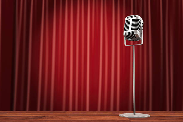 Classic Microphone on Stage With Red Curtain Background. 3D Render