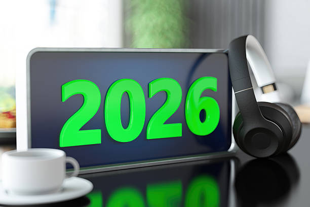 istock Green 2026 Text Displayed on Tablet with Headphones 2228019482