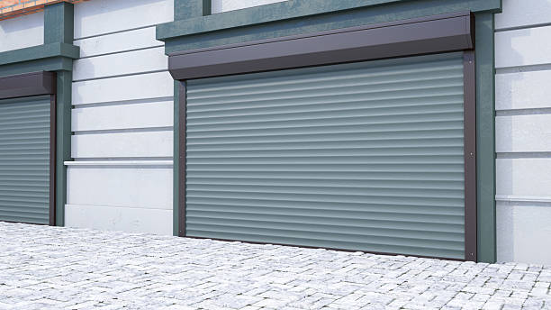 istock Closed Industrial Roller Shutter Door on Modern Building 2228031196