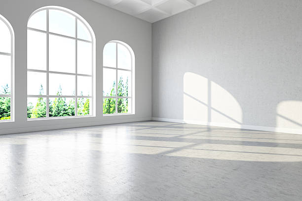 istock Spacious Minimalist Room With Large Arched Windows and Sunlight 2228031683