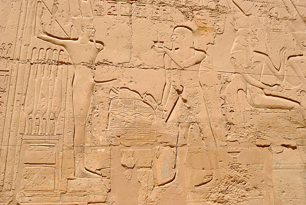 istock Ancient Egyptian wall relief showing pharaohs and deities with offering scenes and hieroglyphs 2228032126