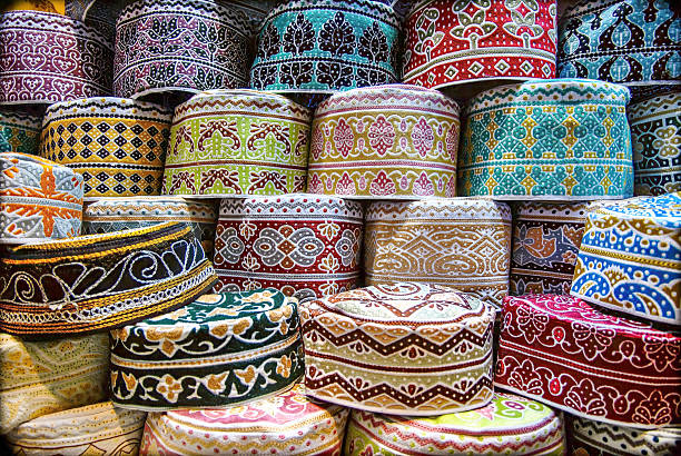 istock Stack of traditional embroidered caps in various colors and patterns 2228032242