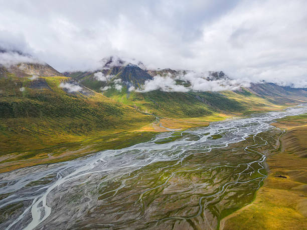 istock Braided river flowing through a colorful mountain valley 2228033948