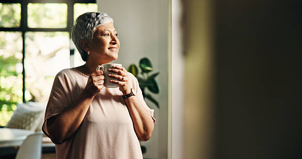 istock Remember, thinking or senior woman with tea in home for ideas, reflection or nostalgia. Decision, coffee or elderly female person drinking beverage with past memory, hope or peace in retirement house 2228035205