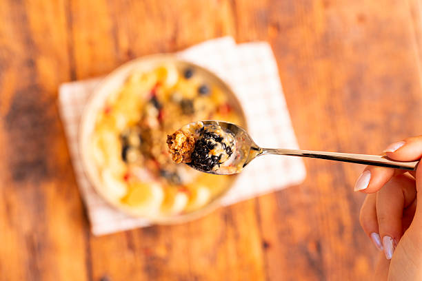 Eating Healthy Breakfast with Spoon