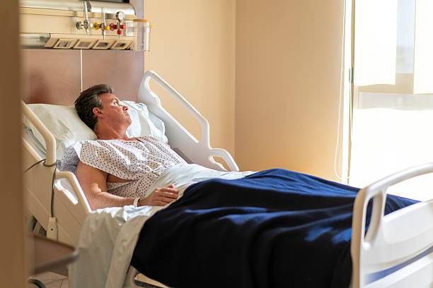 istock Hospitalized man recovering and observing through the window 2228049478