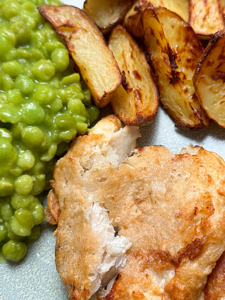 Fish and chip serving at glasgow scotland england UK