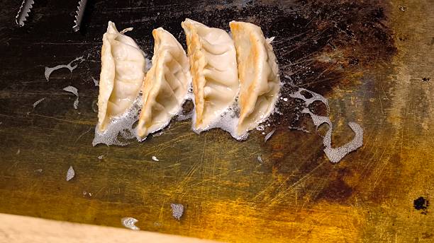 istock Dumplings in oil. Deep-fried in oil. 2228052677