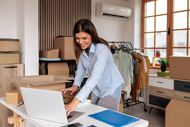 istock Female Entrepreneur Managing Orders at Home 2228054764