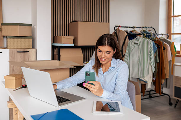 istock Home-Based Businesswoman Using Phone 2228054935