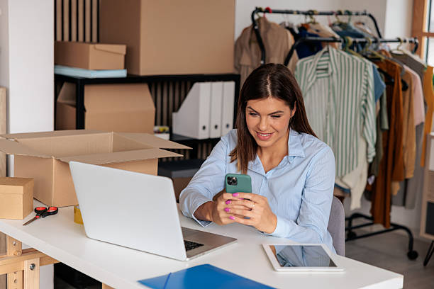 istock Home-Based Businesswoman Using Phone 2228055000