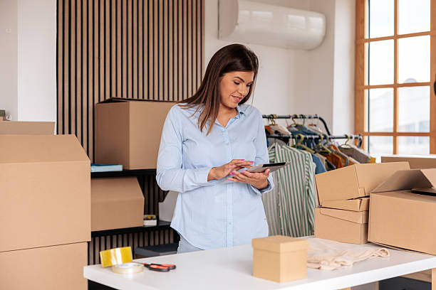 istock Female Entrepreneur Managing Orders at Home 2228059549